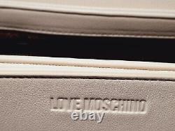 Nouveau sac bandoulière Ivery Love Moschino argenté et doré, orné de clous.